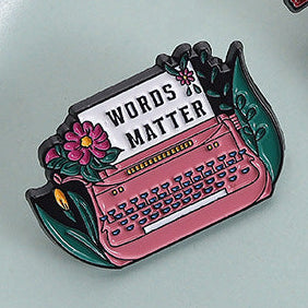 'Words matter' enamel pin