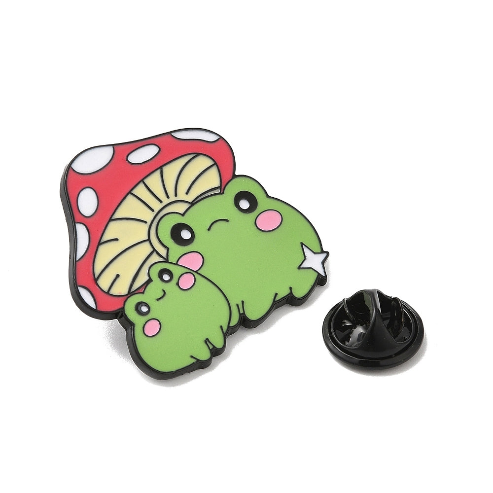Two frogs sitting under a mushroom enamel pin