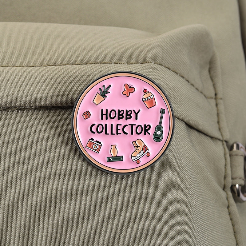 'Hobby collector' enamel pin
