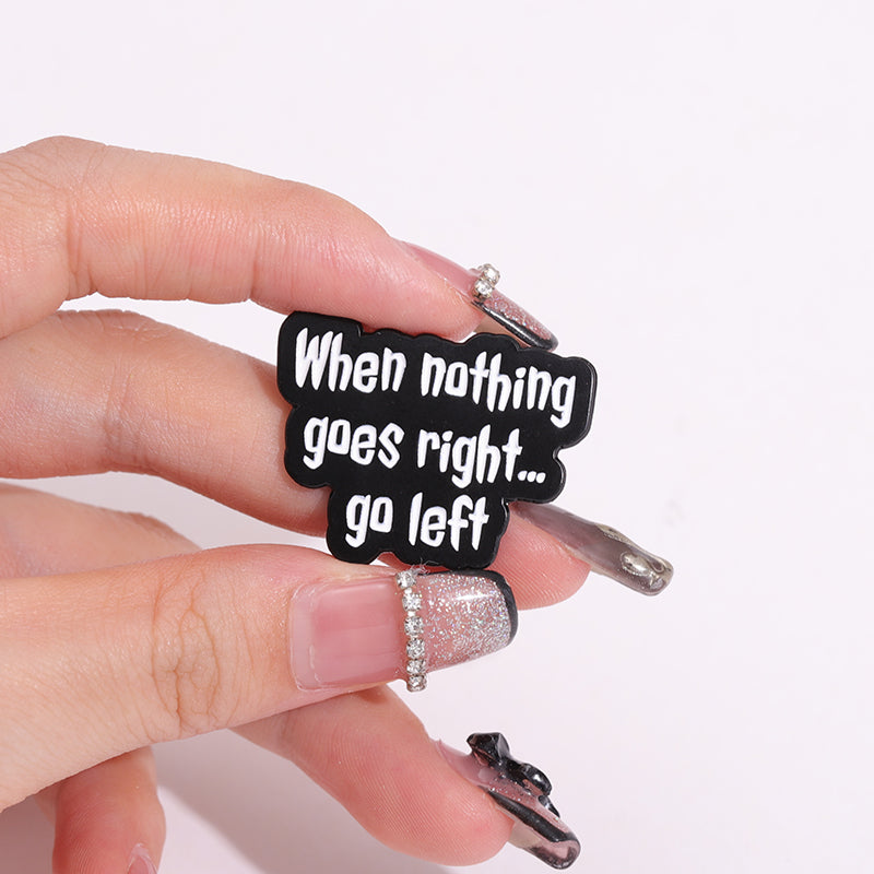 'when nothing goes right...go left' enamel pin