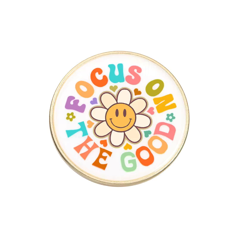 'Focus on the good' enamel pin