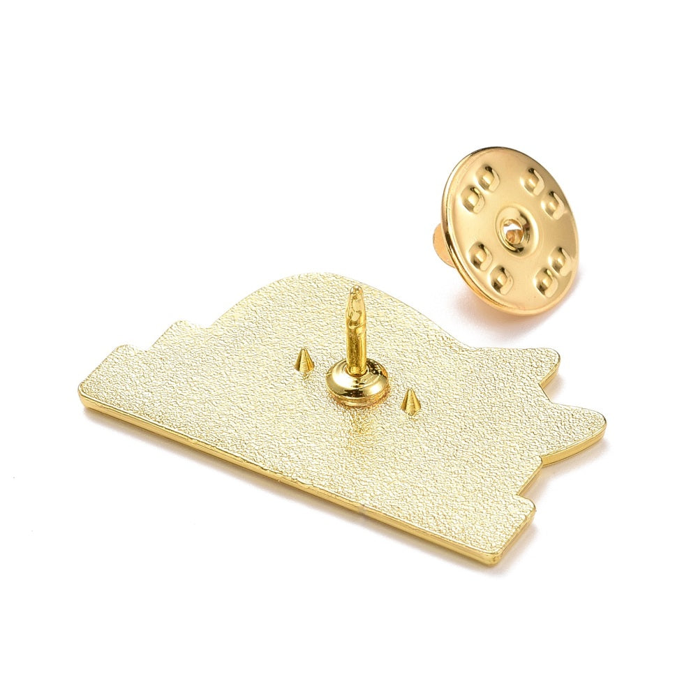 Cat sleeping on books enamel pin