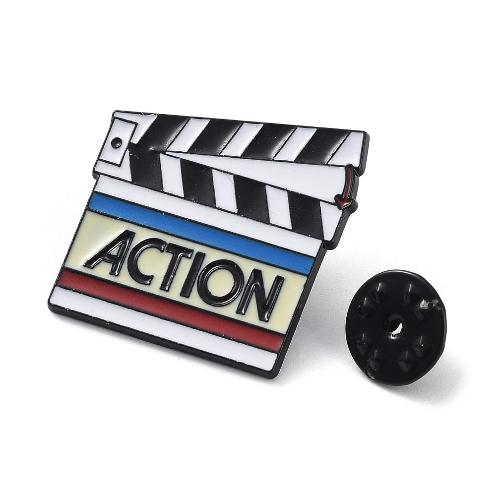 'Action' clapper board enamel pin