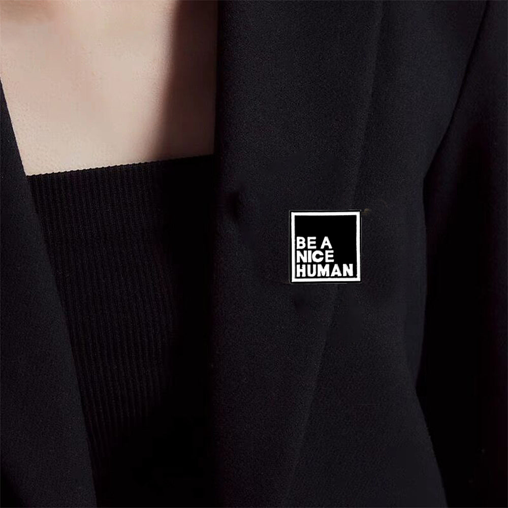 'Be a nice human' enamel pin