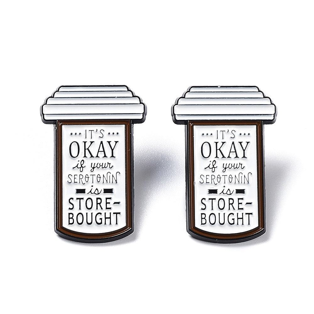 Pill box with 'it's ok if your serotonin is store bought' words enamel pin