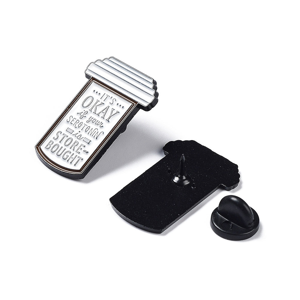 Pill box with 'it's ok if your serotonin is store bought' words enamel pin