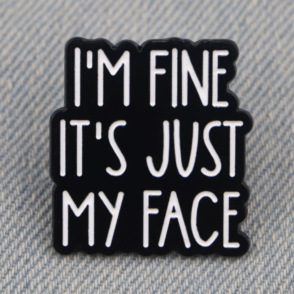 'I'm fine it's just my face' enamel pin