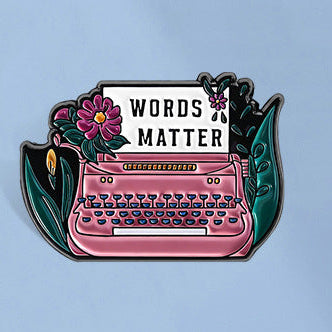 'Words matter' enamel pin
