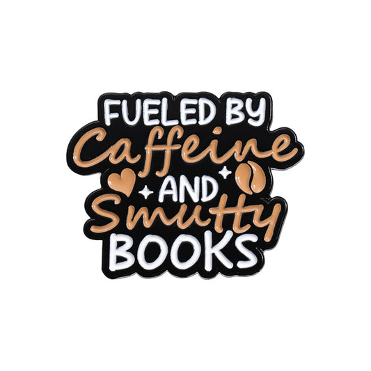 'Fueled by caffeine and smutty books' enamel pin