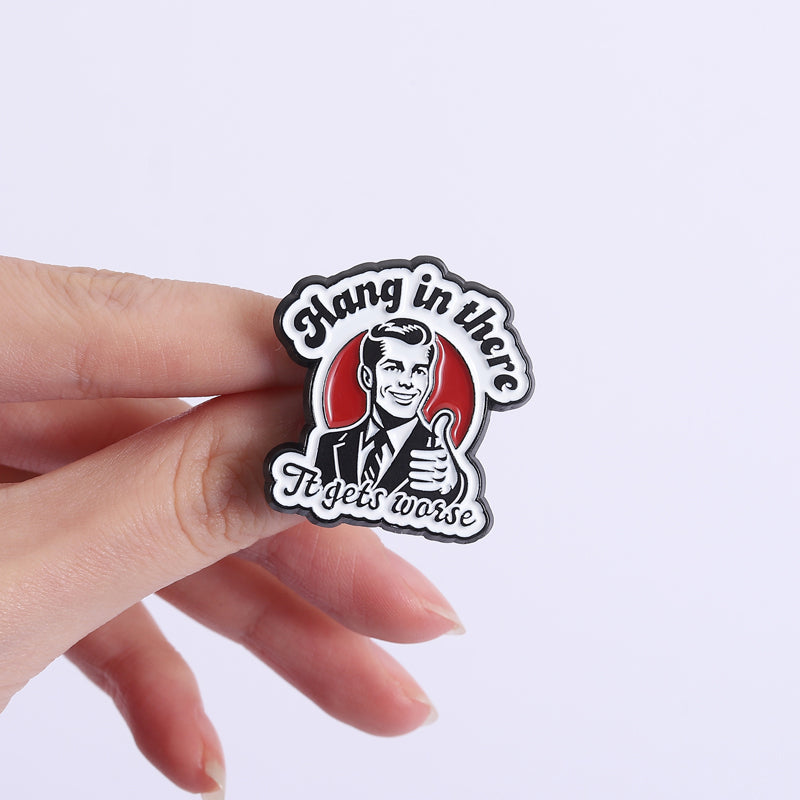 'Hang in there it gets worse' enamel pin
