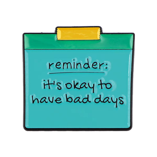 'Reminder: it's okay to have bad days' enamel pin
