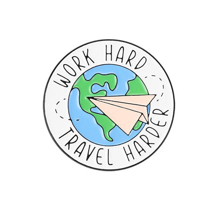 'Work hard travel harder' enamel pin