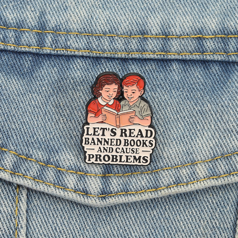 'Let's read banned books and cause trouble' enamel pin