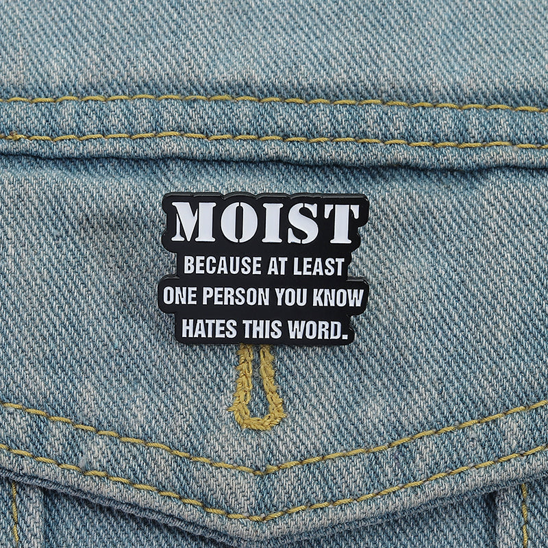 'Moist because at least one person you know hates this word' enamel pin