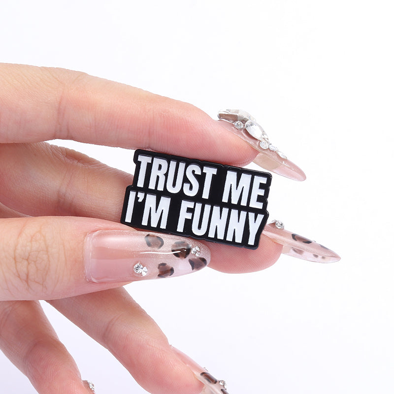 'Trust me I'm funny' enamel pin