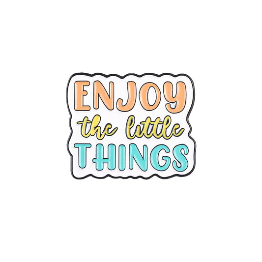 'Enjoy the little things' enamel pin