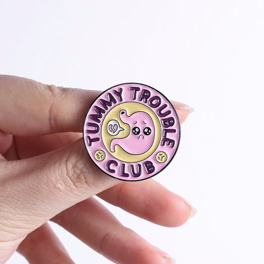 'Tummy trouble club' enamel pin