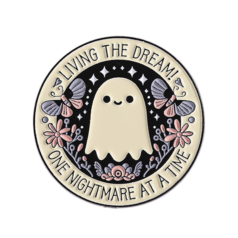 'Living the dream one nightmare at a time' enamel pin