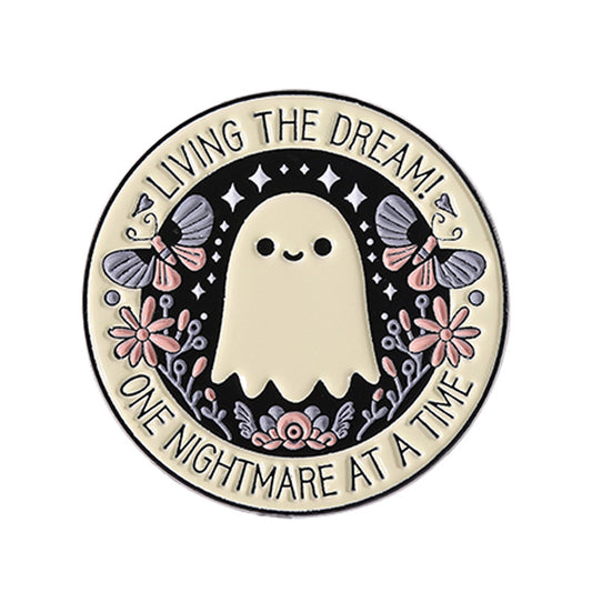 'Living the dream one nightmare at a time' enamel pin