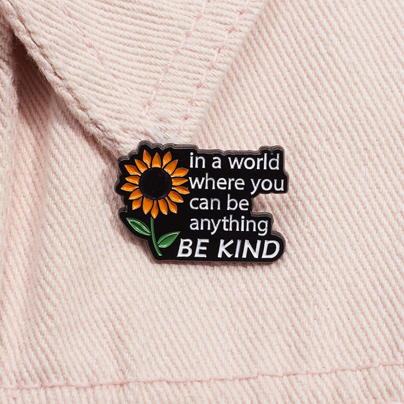 'In a world where you can be anything BE KIND' enamel pin