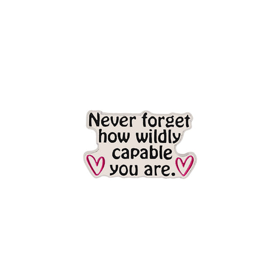 'Never forget how wildly capable you are' enamel pin