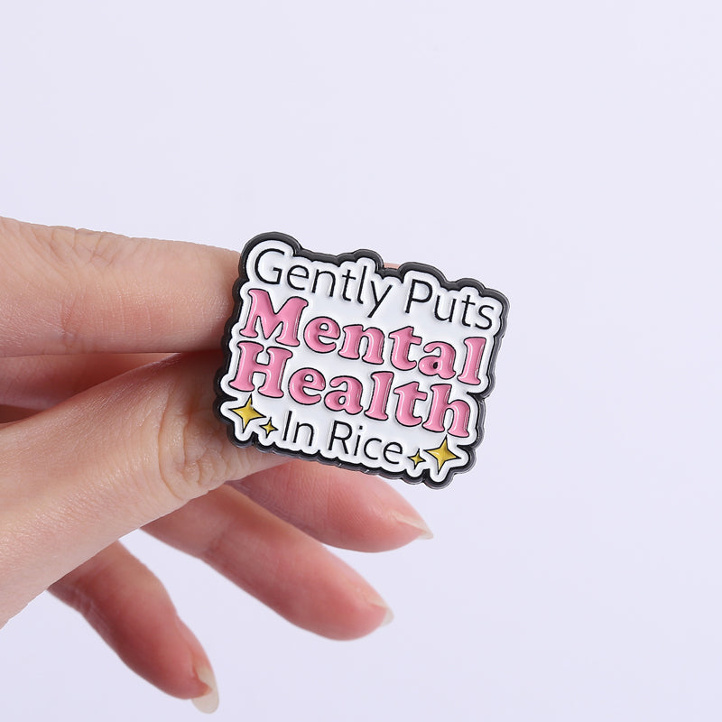 'Gently puts mental health in rice' enamel pin