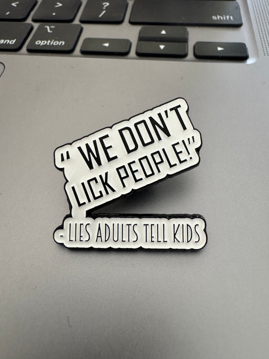'We don't lick people' enamel pin