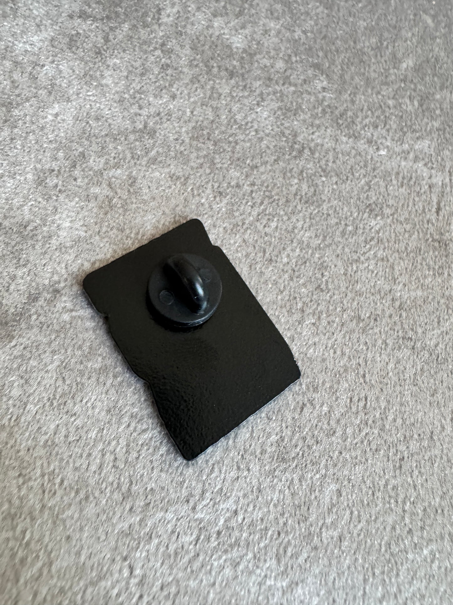 Walking HR violation enamel pin