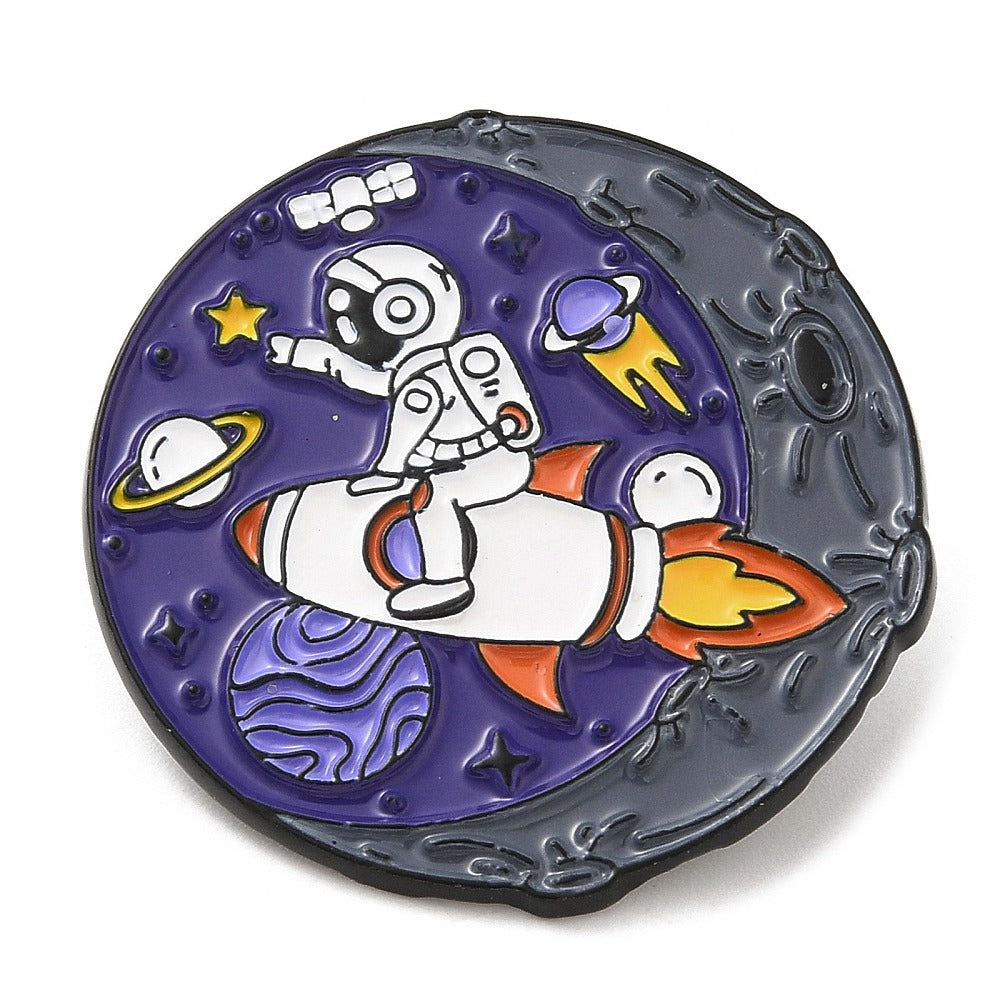 Spaceman riding a rocket enamel pin – Jelly Metal