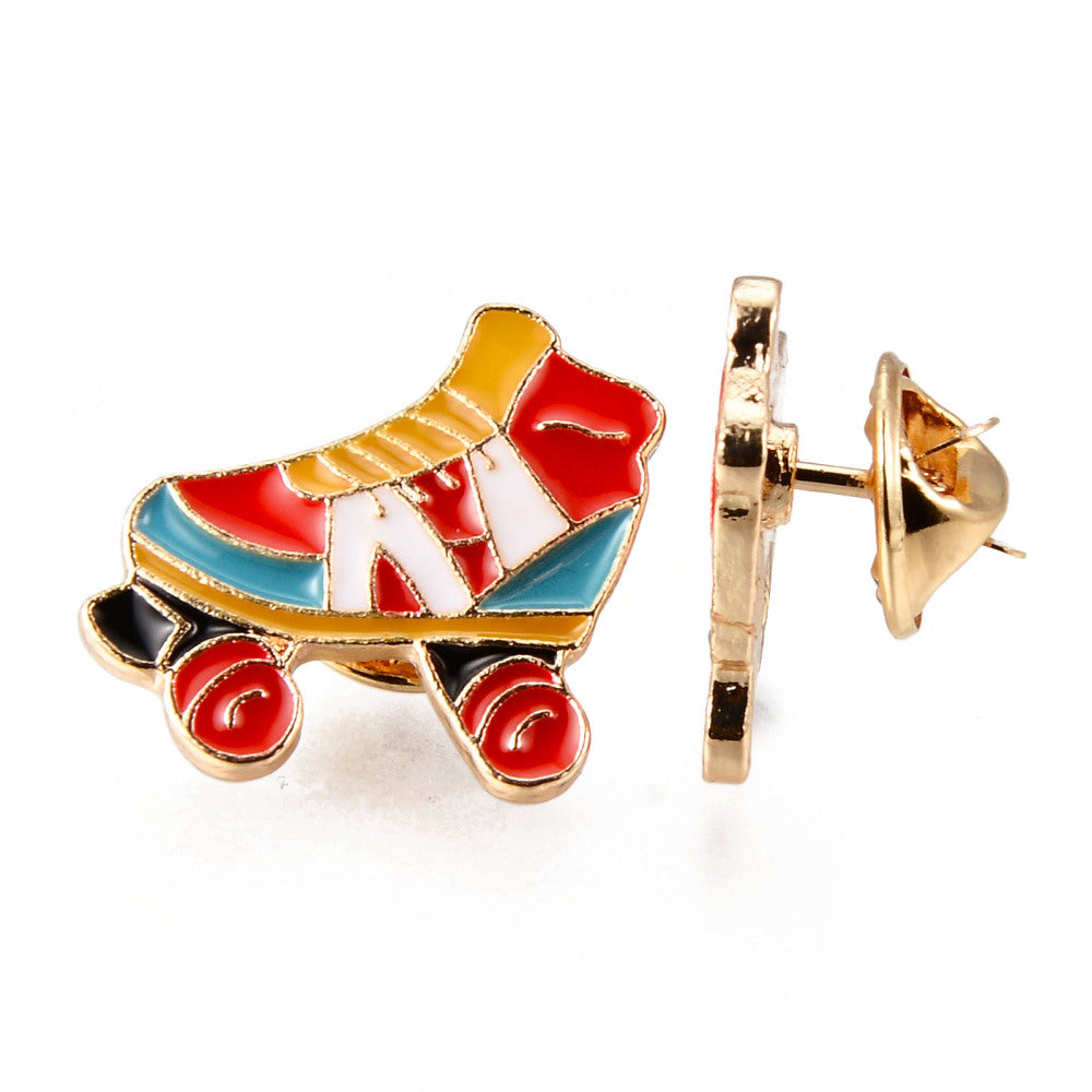 Red blue yellow roller skates enamel pin