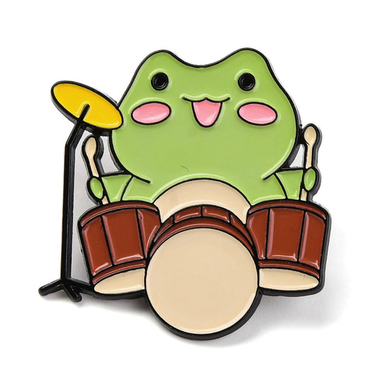 Drumming frog enamel pin