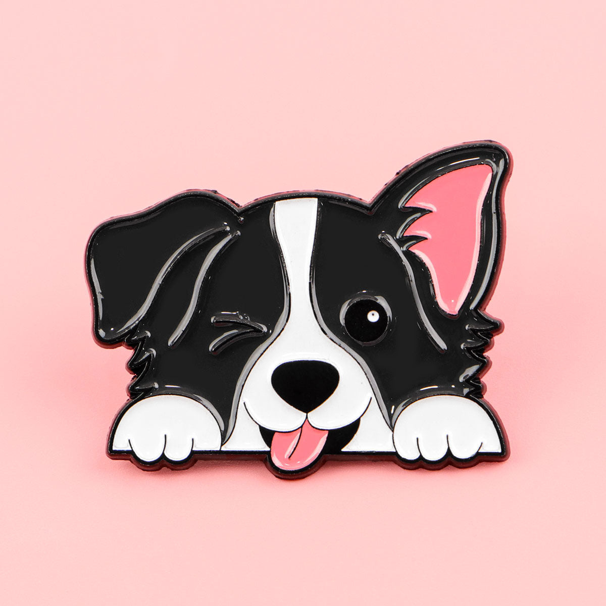 Black and white dog enamel pin
