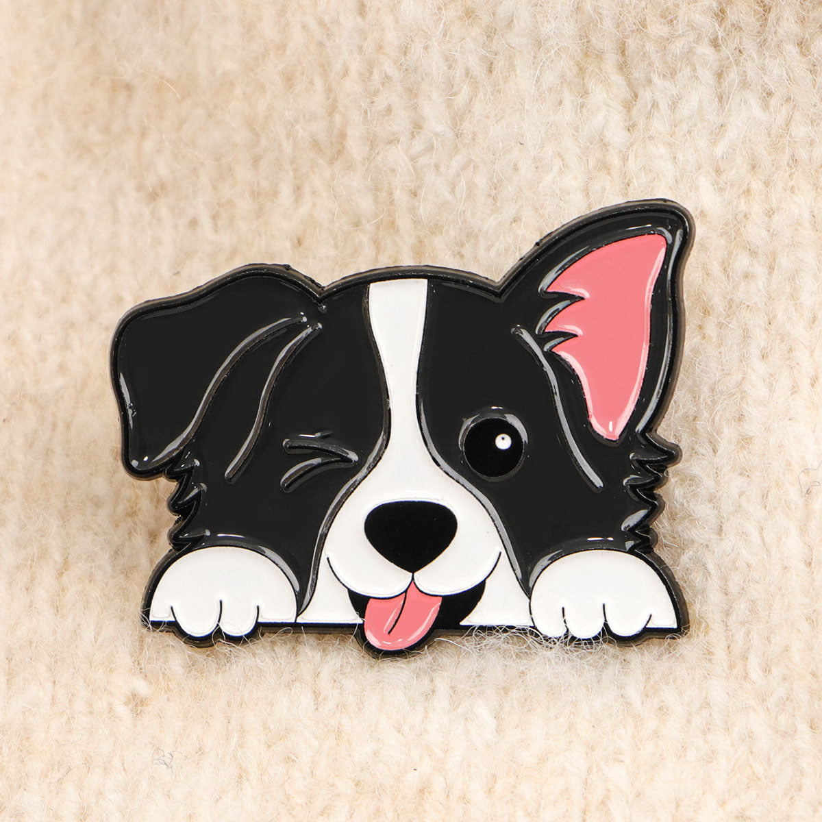 Black and white dog enamel pin