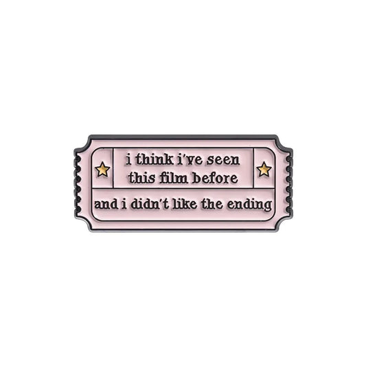 Ticket with 'i think I've seen this film before' enamel pin